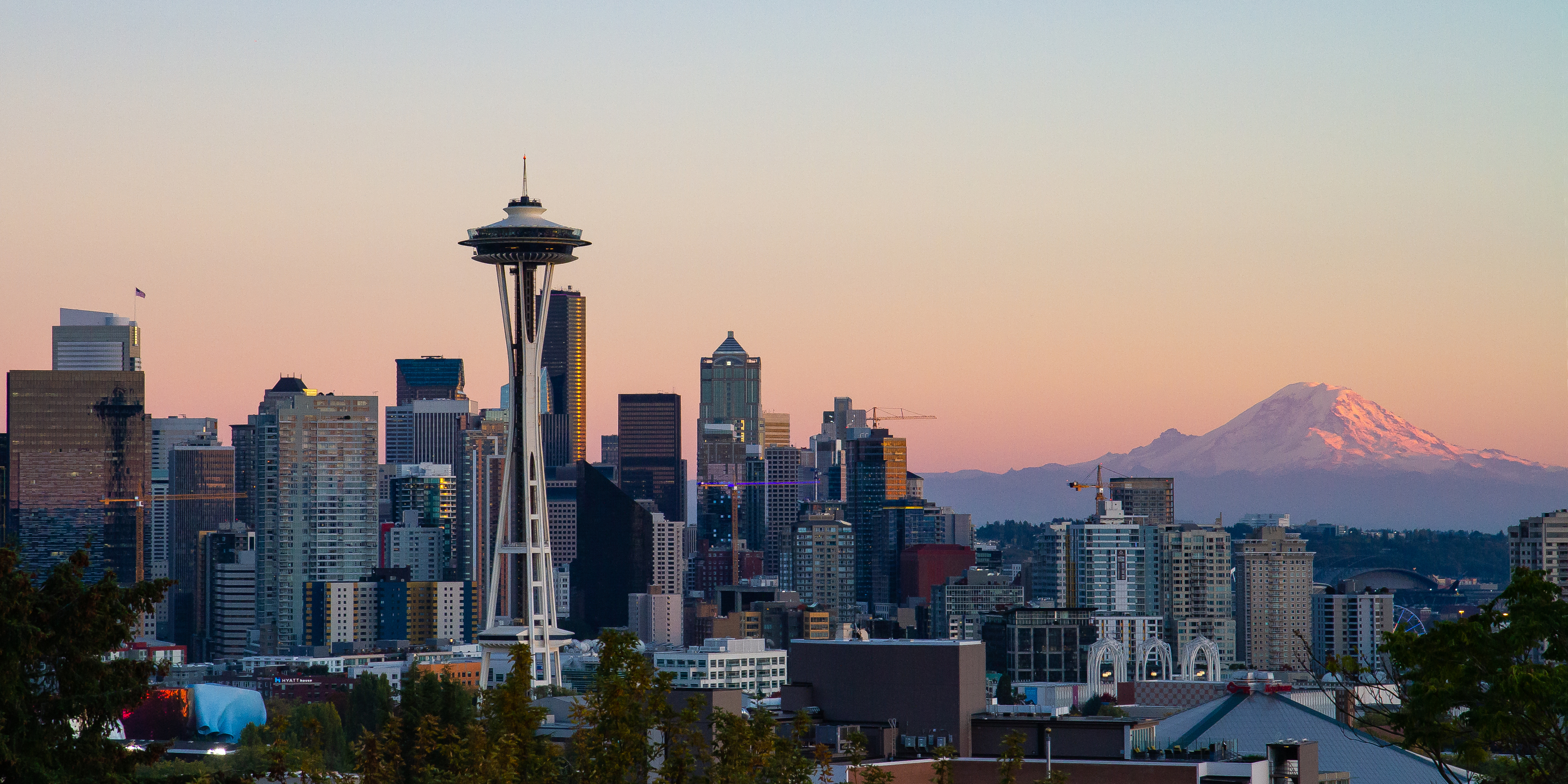 Seattle Skyline from Kerry Park with Mount Rainier in the background, showcasing the iconic cityscape with modern buildings and natural beauty